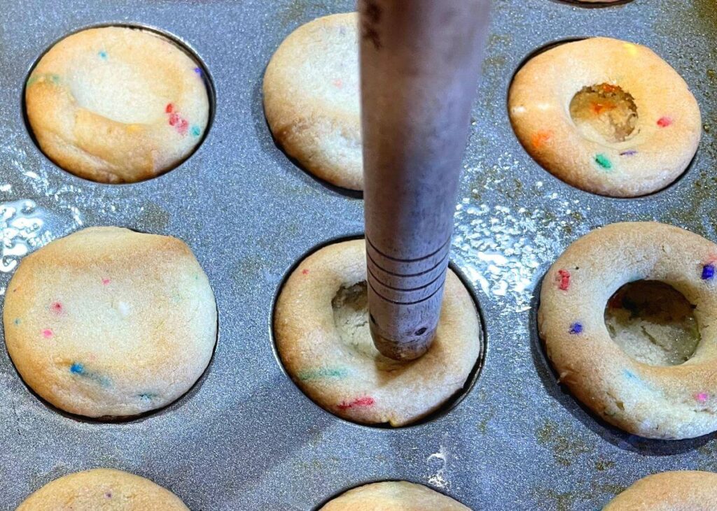 Step 1 Wooden Spoon making indent in cookies