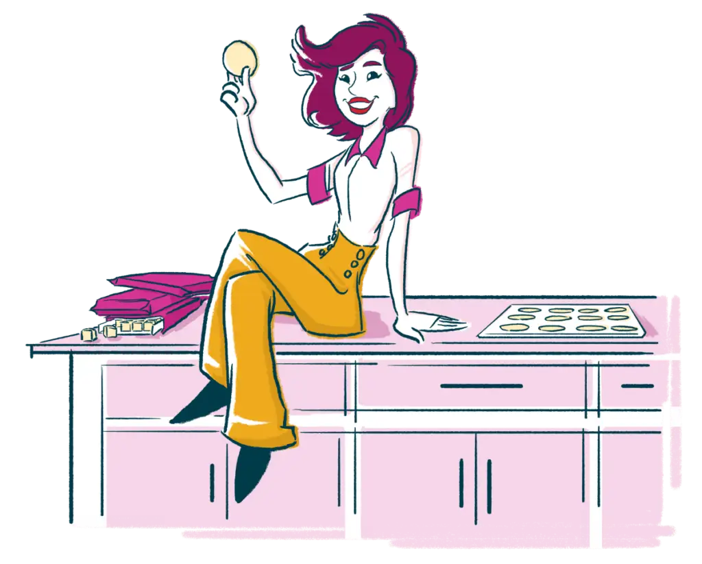 Illustration of a woman sitting on a kitchen island next to packages of Confetti Cookie Dough and a tray of baked cookies. She's holding a confetti cookie from Wooden Spoon Cookie Dough in her hand.