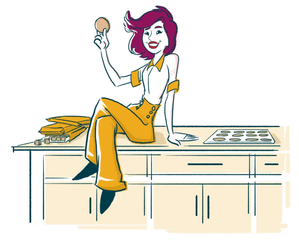 Illustration of a woman sitting on a kitchen island next to packages of Peanut Butter Cookie Dough and a tray of baked cookies. She's holding a peanut butter cookie from Wooden Spoon Cookie Dough in her hand.